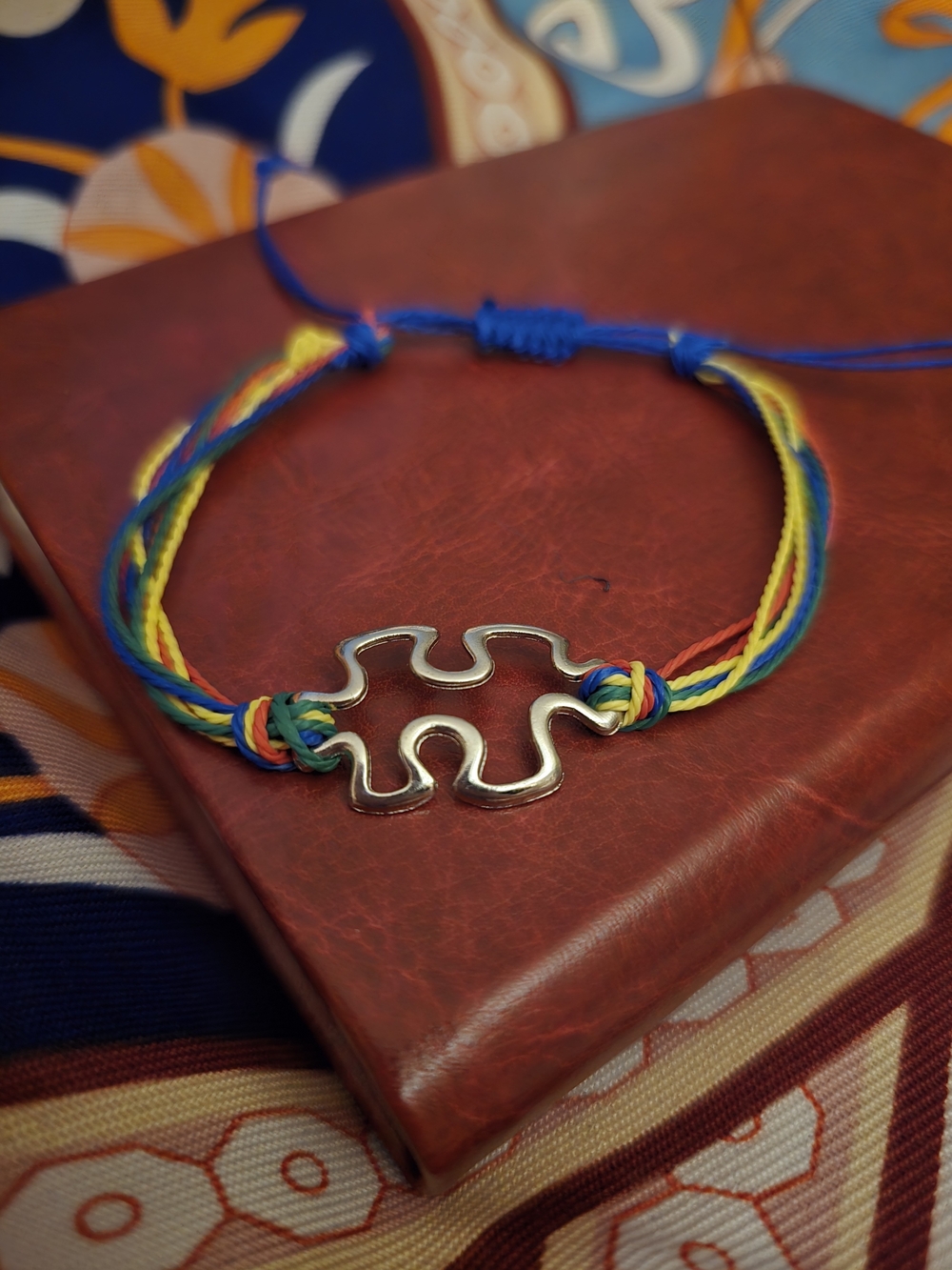 Autism Awareness And Acceptance Rainbow Cord Bracelet with Silver Puzzle Charm